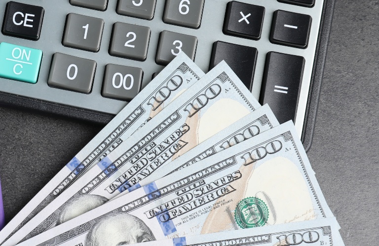 calculator and dollars