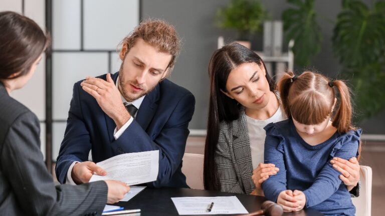 divorced couple with daughter is consulting with lawyer